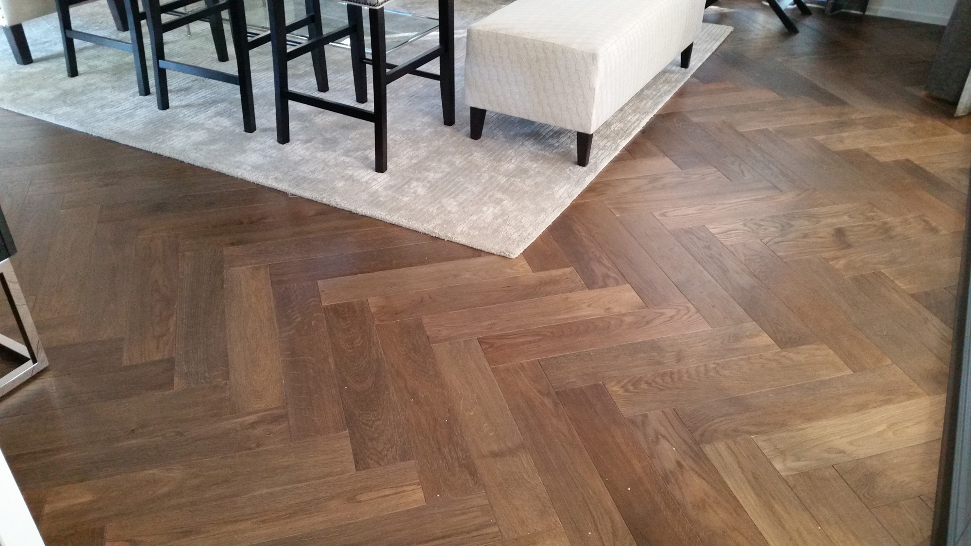 Engineered timber herringbone floor in a living area